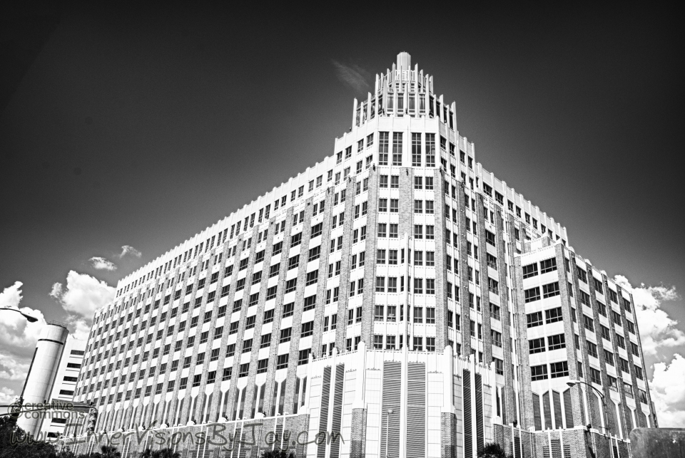 Pale white glow of San Antonio building by night