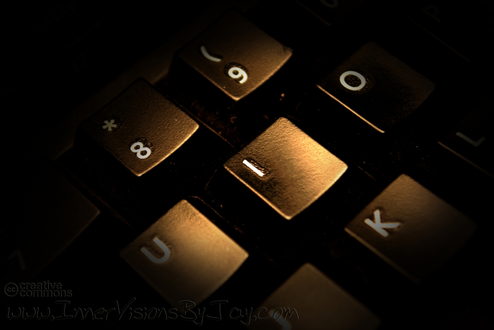 Macro of computer keyboard with focus on the letter 'I'