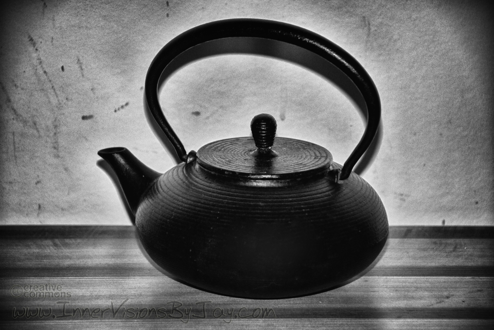 Cast iron teapot in black and white